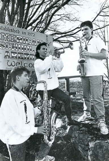 7 March 1990, Aberdeen American School, The three soloists with Aberdeen's American School Latin Band - (left to right) Ryan Kern (16), Aberdeen; Mike Running (14), Edzell, and Moe Plaisance (15), Aberdeen - get in some practice yesterday before leaving with the rest of the band and teacher Mr Mike Urquhart for a concert tour of Spain