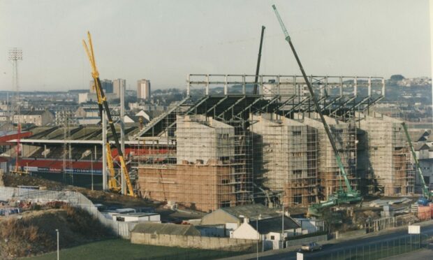 From December 1992: "The new face of Pittodrie: Work on the new Beach End Stand dominates the Aberdeen skyline."