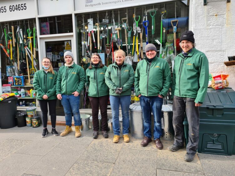 The Birons Ironmongers team lined up outside the shop in Wick.