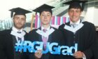 Toby Boston, Rohan Chapman and James Chalmers were among today's graduates. Picture Chris Sumner/DC Thomson