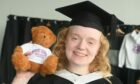 Lena Forsyth celebrates her graduation with a memento bear. Picture by Chris Sumner/DC Thomson.