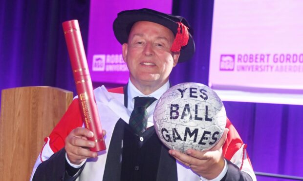 Graham Hunter with his honorary degree. Picture by Chris Sumner/DC Thomson.