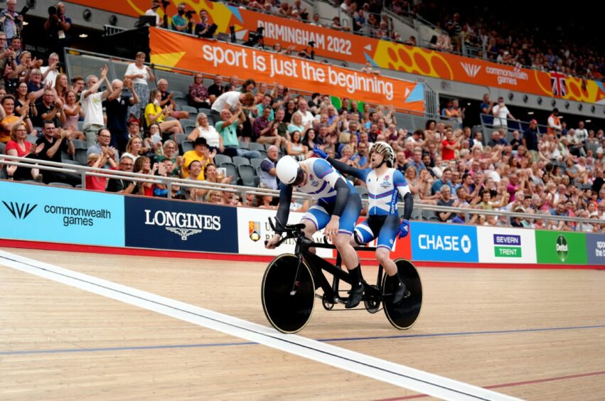 Scotland's Neil Fachie and pilot Lewis Stewart on their way to winning gold in the Men's Tandem B - 1000m Time Trial. Photo credit should read: John Walton/PA Wire. RESTRICTIONS: Use subject to restrictions. Editorial use only, no commercial use without prior consent from rights holder.