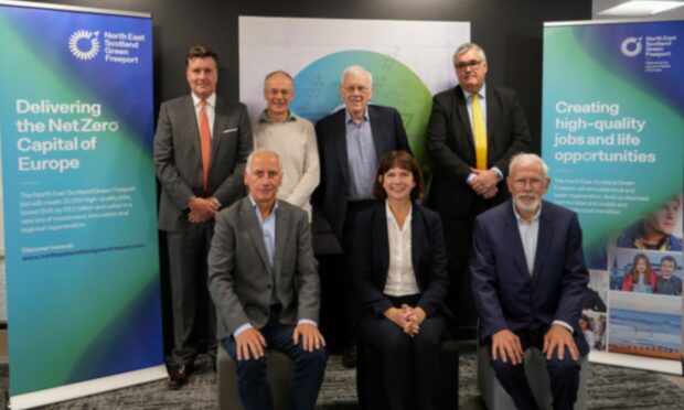 Supporters of the North East Scotland Green Freeport bid. Back row left to right: David Currie, chairman, Proserv; Alan James, chief technology officer, Storegga; Sir Ian Wood; Jon Oakey, chief financial officer, Port of Aberdeen 
Front left to right: Trevor Garlick, vice chair, ETZ Ltd; Maggie McGinlay, chief executive of ETZ Ltd; Mike Fleming. Image ETZ