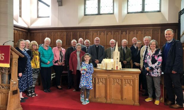 Fettercairn Church congregation with the model. Supplied by Jim Miller.