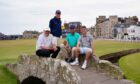 Team Watson - Paul Lawrie, Tom Watson, Stewart Cink and Kipp Popert pose for a photo on the Swilcan Bridge.