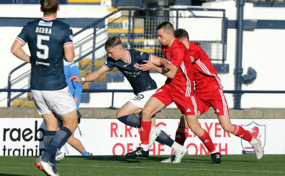 Peterhead winger Cody McLeod tangles with Ethan Ross
