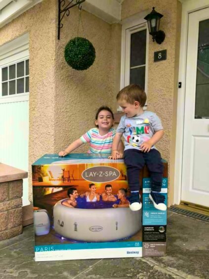 Lauryn, of Aberdeenshire, is doing really well now and loves to play with her little brother Ryan following her cannabis oil prescription.