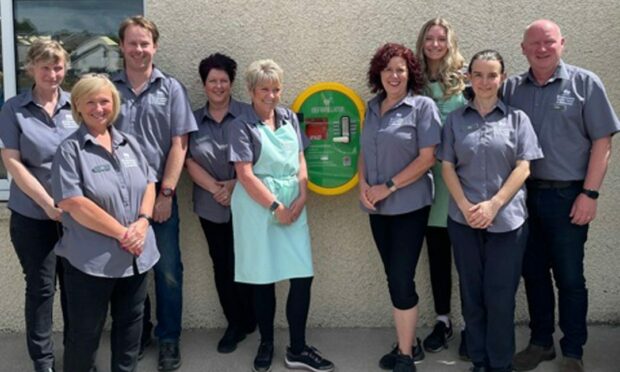 Kirktown Garden Centre staff with the new defibrillator.