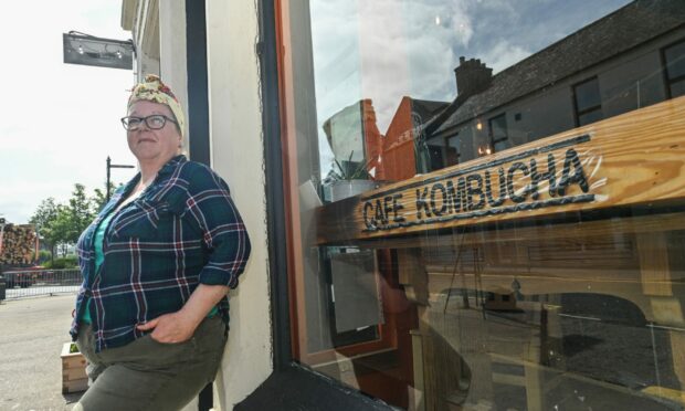 Sarah Borthwick, owner of Cafe Kombucha, outside her business in June 2021. Photo: Jason Hedges/DC Thomson