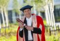 Lord Berkeley of Knighton was given an honorary degree from Aberdeen University for services to music today. Pic: Kath Flannery/DCT Media