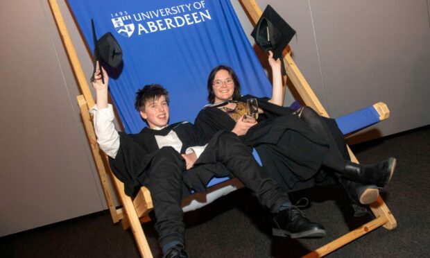 Eleanor Campbell, who studied English with Creative Writing,  and Beatrix Livesey-Stephens, a Language and Linguistics graduate, at the Aberdeen University graduations on Thursday. Picture by Kath Flannery/DC Thomson.