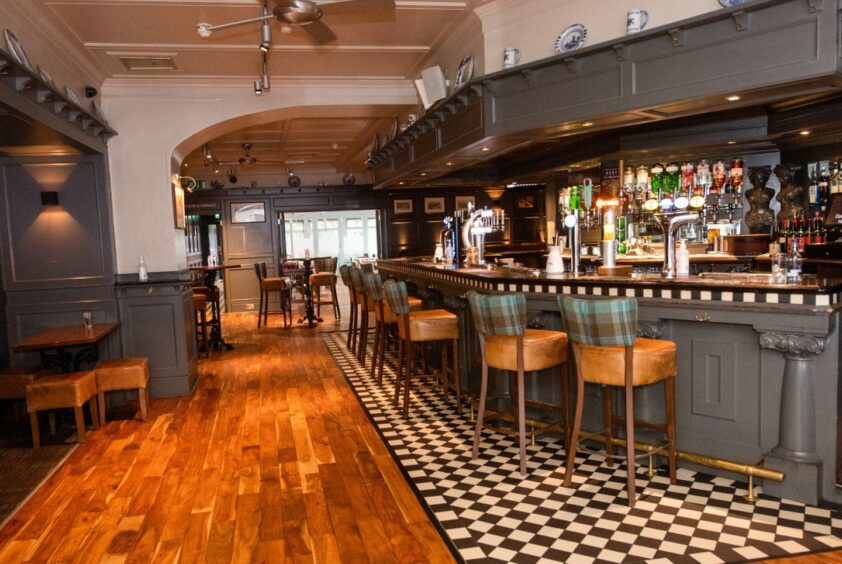 the bar area of the Dutch Mill hotel, which is on Aberdeen's Queen's Road. 