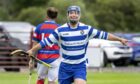 Newtonmore's Iain Robinson gets his hat-trick to secure a 3-3 draw at Kingussie in July.