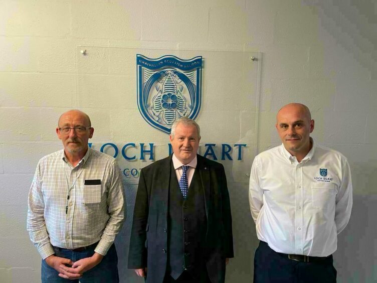 To go with story by Simon Warburton. Ian Blackford visits Loch Duart as labour shortage grows. Picture shows; Alec Macmillan, Factory Manager; Ross, Ian Blackford; Russell Leslie, Processing Director at Loch Duart