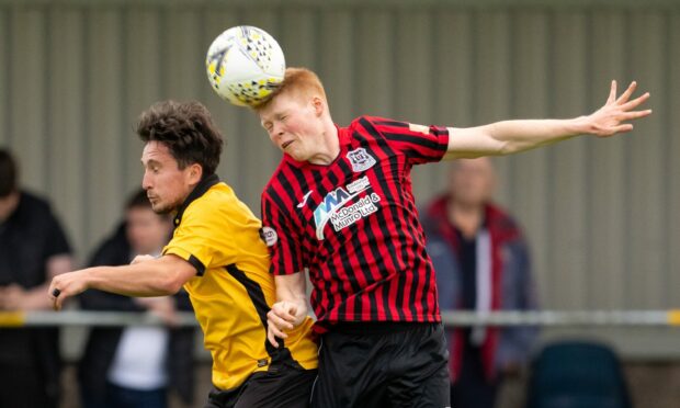 Elgin City defender Owen Cairns in action against Nairn County.