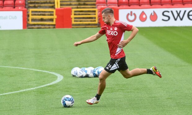 Ylber Ramadani in action at the Pittodrie open training session. Picture by Paul Glendell