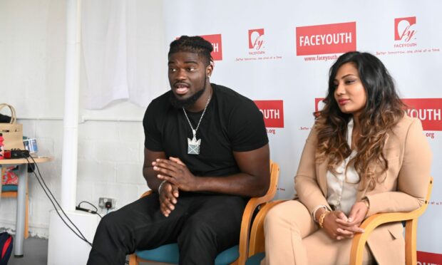 Aberdeen councillor Deena Tissera, right, and NFL player David Ojabo at Face Youth, Tullos, Aberdeen, on Thursday. Picture by Paul Glendell