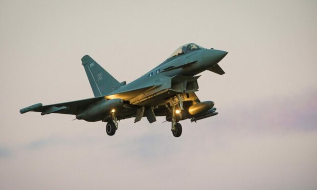 Single Typhoon coming into land at RAF Lossiemouth.