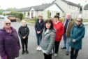 'We'll chain ourselves to the beds if we have to': Some of the families fighting plans to close Budhmor Care Home in Portree. Pictured: (L-R) Kathie Ford, Eoghainn Graham, Sandra MacLeod, Mairi MacDonald, Jessie MacKinnon, Neil Annand and Mandy Bowdler. Pic: Sandy McCook/DCT Media