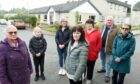 'We'll chain ourselves to the beds if we have to': Some of the families fighting plans to close Budhmor Care Home in Portree. Pictured: (L-R) Kathie Ford, Eoghainn Graham, Sandra MacLeod, Mairi MacDonald, Jessie MacKinnon, Neil Annand and Mandy Bowdler. Pic: Sandy McCook/DCT Media