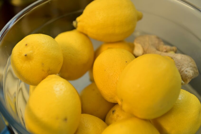A bowl of lemons that are used in preserves