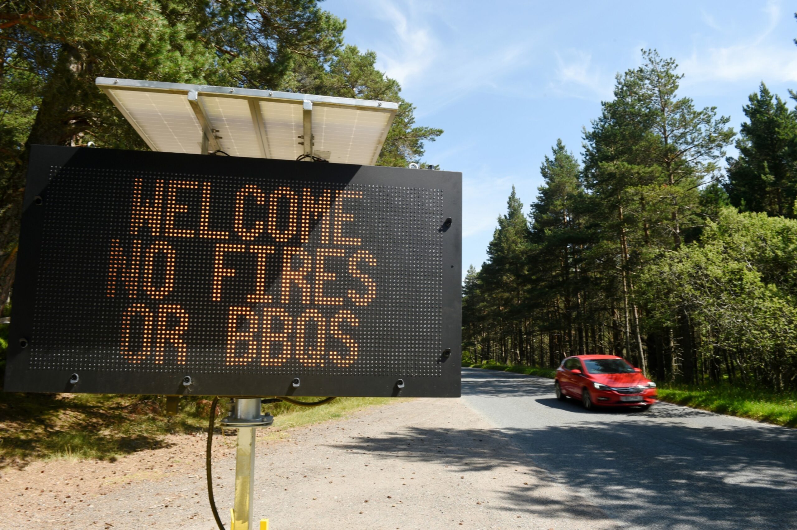 A sign at Loch Morlich, advising people to not start fires or use barbecues in July 2022. 