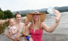 Another hot day in Strathspey and Aviemore with people making the most of the beach and water at Loch Morlich. (L-R) Olivia Ferrier (14mths) with her mum Amie , Zac Burns (3) with his mum Hannah enjoy the waters of Loch Morlich. Sandy McCook/DCT Media
