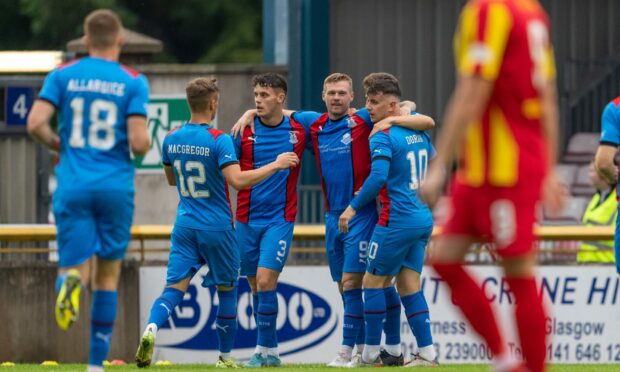 ICT striker Billy Mckay celebrates his goal.