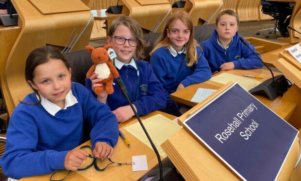 Lowena (left), mascot Walnut, Angus, Cara and Tommy represented Rosehall Primary at the Euroquiz 2022 final. Not pictured: reserve team member Lochlan