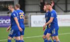 Cove Rangers players congratulate goalscorer Rory McAllister. Pictures by Scott Baxter