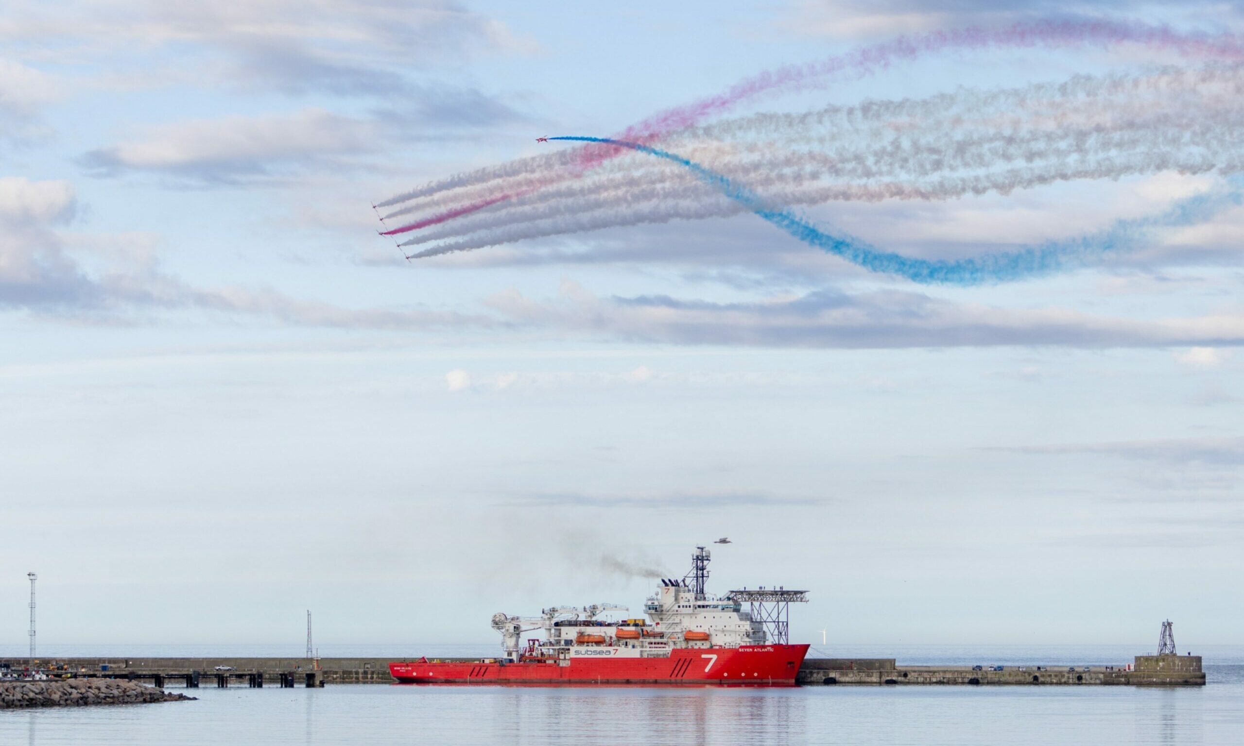 Red Arrows performing a corkscrew stunt in the sky over Peterhead Harbour at last year's Scottish Week.