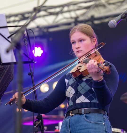 Fiddler on stage at SpeyFest 2022. Pictures by Jasperimage.