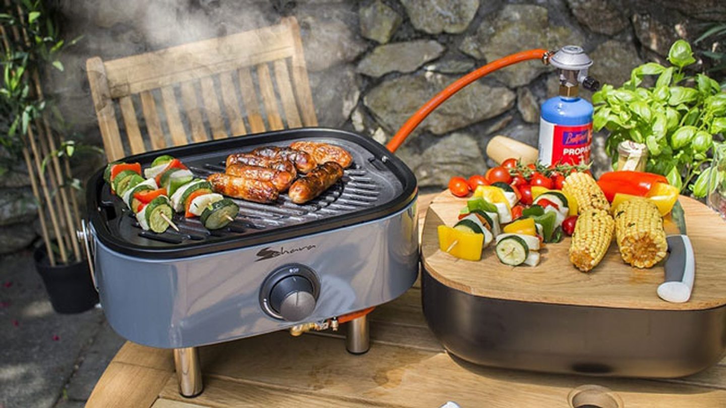 Small portable bbq with food