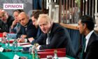Boris Johnson chairs a cabinet meeting in May, flanked on his left by Rishi Sunak and on his right by Sajid Javid. Both have now resigned (Photo: Oli Scarff/AP/Shutterstock)