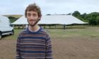 Benji Brown spokesperson for Climate Camp Scotland setting up on Thursday morning.