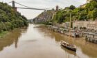 A tall ship meanders along the River Avon and underneath the Clifton Suspension bridge as boats, ships and all manner of sea-going vessels descend on Bristol in preparation for the weekend harbour festival. Ben Birchall/PA Wire