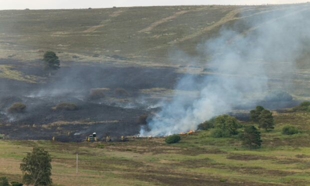 The wildfire is currently underway in Ballindalloch, Moray. 
Photo from: Jasperimage and Brian Smith,