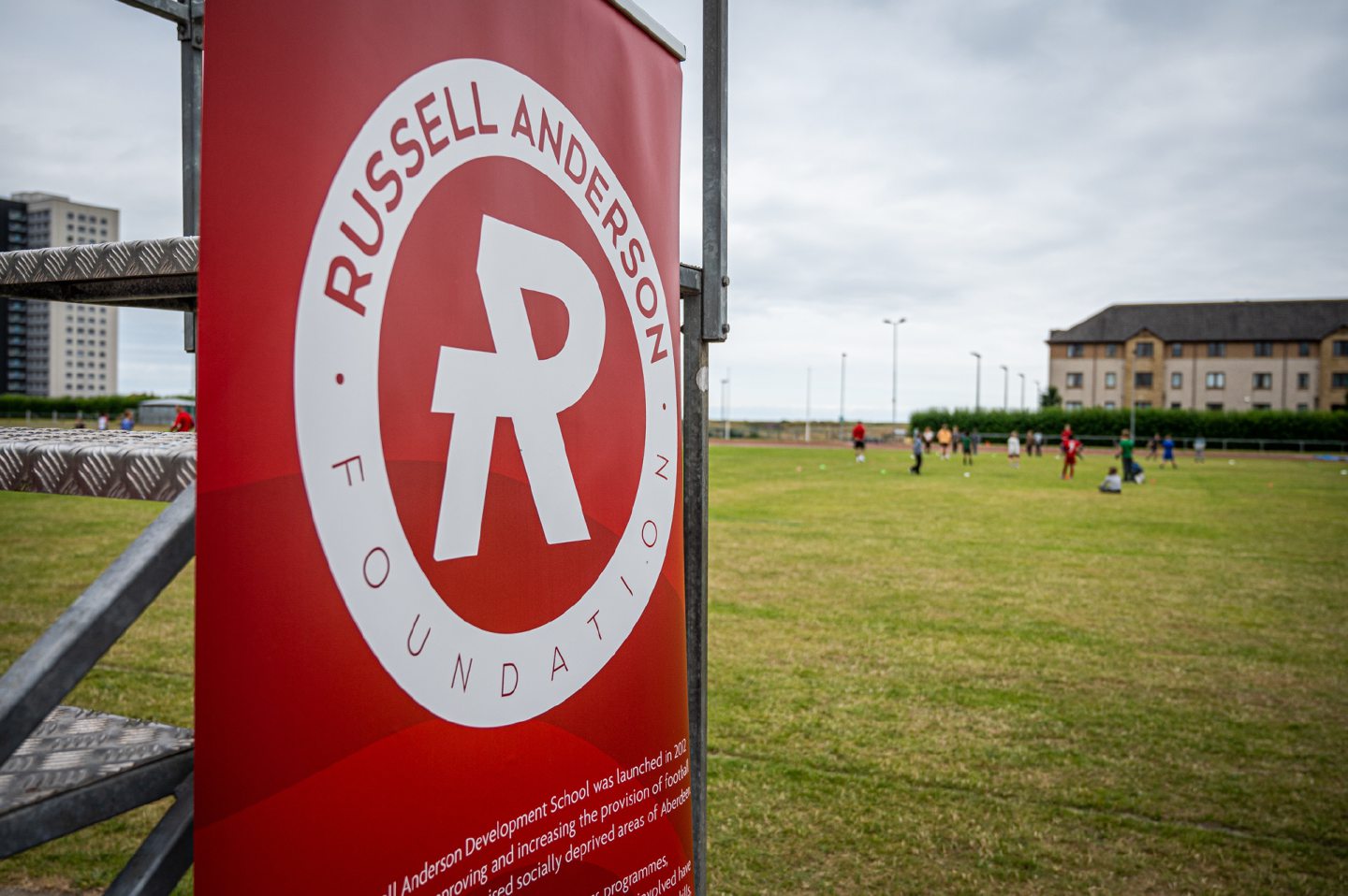 Banner for The Russell Anderson Development School with logo that reads: "Russell Anderson Foundation".