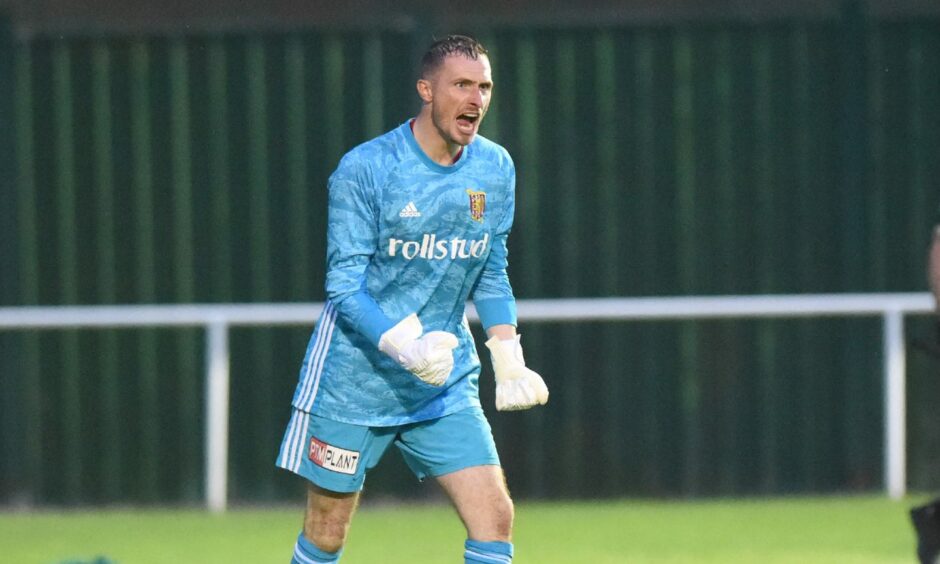 Ewen Macdonald celebrating a penalty