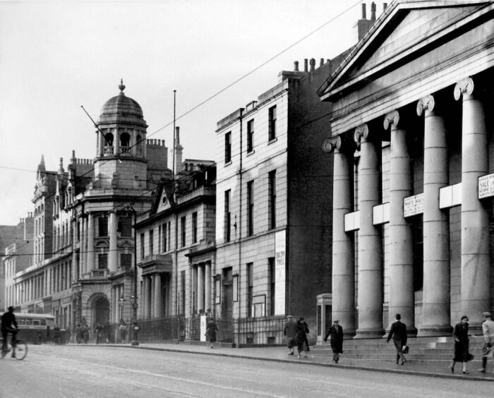 An old photo of the Music Hall, the YMCA and the Royal Northern Club.
