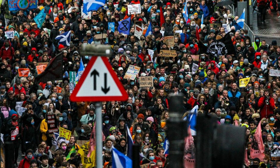 Thousands of people marched in Glasgow during November 2021 as part of a global day of action. Photo by Ewan Bootman/NurPhoto/Shutterstock