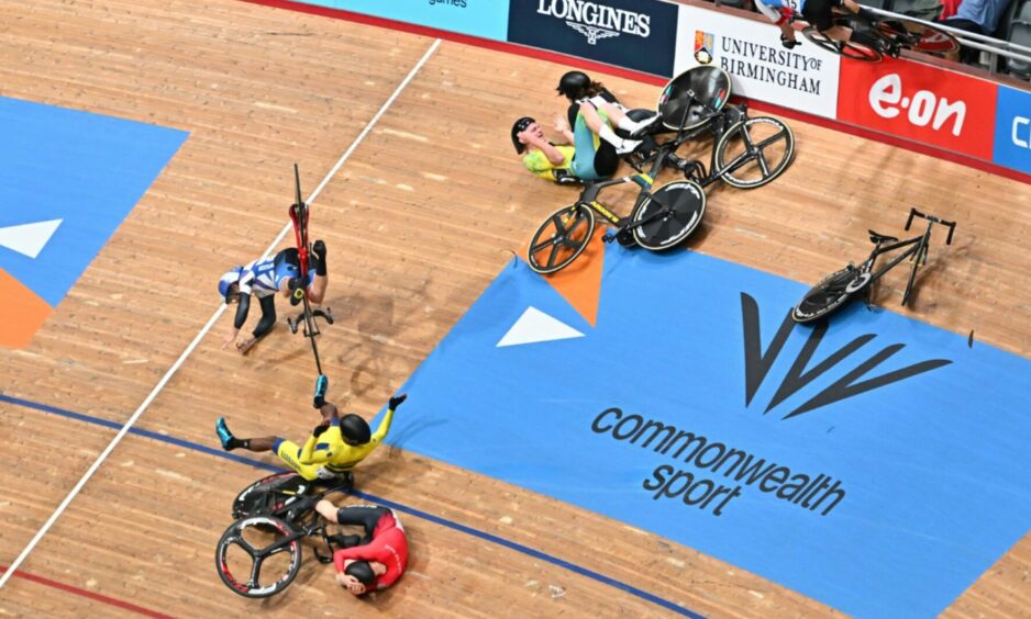 Kyle Gordon, in the Scotland jersey on the left, is taken out as part of the major crash on July 31 at the Lee Valley VeloPark