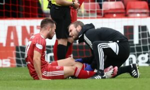 Out until after the World Cup: Aberdeen winger Callum Roberts will not be rushed back from long term injury, says boss Jim Goodwin