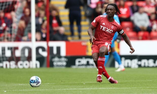 Aberdeen's captain Anthony Stewart in action against St Mirren.