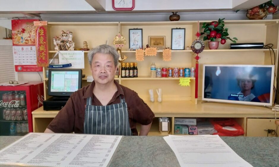Martin Tang in the Royal Crown Chinese takeaway in Aberdeen.