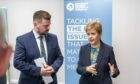 Ryan Crighton, head of policy and communications at AGCC and a critic of the strategy, and Nicola Sturgeon. Imge: Michal Wachucik/Abermedia