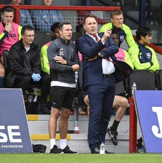 Malky Mackay and assistant Don Cowie at the side of the pitch