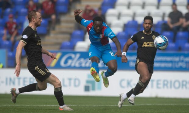 Austin Samuels finishes to put Caley Thistle 1-0 up against Cove Rangers