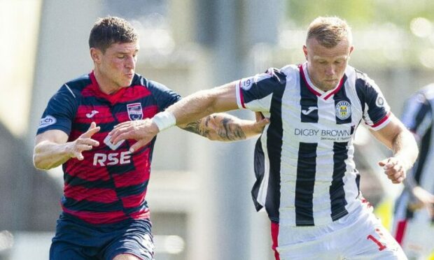 Ross County midfielder Ross Callachan and St Mirren's Curtis Main in action.